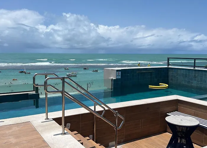 Flat a beira mar pé na areia