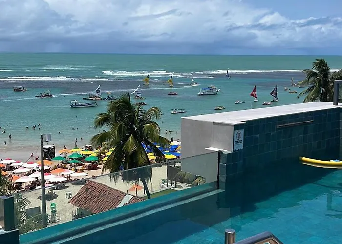 Flat a beira mar pé na areia